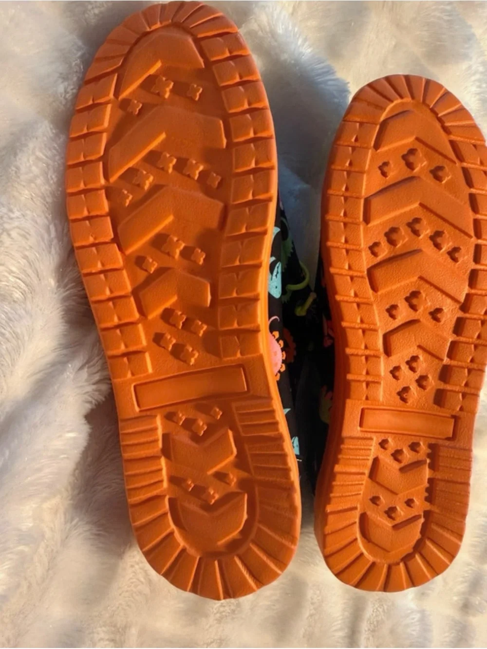 Kids Black Dinosaur Print Slip-On Shoes with Orange Sole